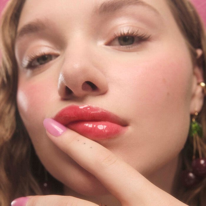 https://www.elfcosmetics.com/dw/image/v2/BBXC_PRD/on/demandware.static/-/Sites-elf-master/default/dwc56a3293/2025/GlowReviverMeltingLipBalm/101524_GRLB_IGF_Mykena_Hero-WildCherry_0126_FINAL_RGB_IGF.jpg?sw=700&q=90&strip=false