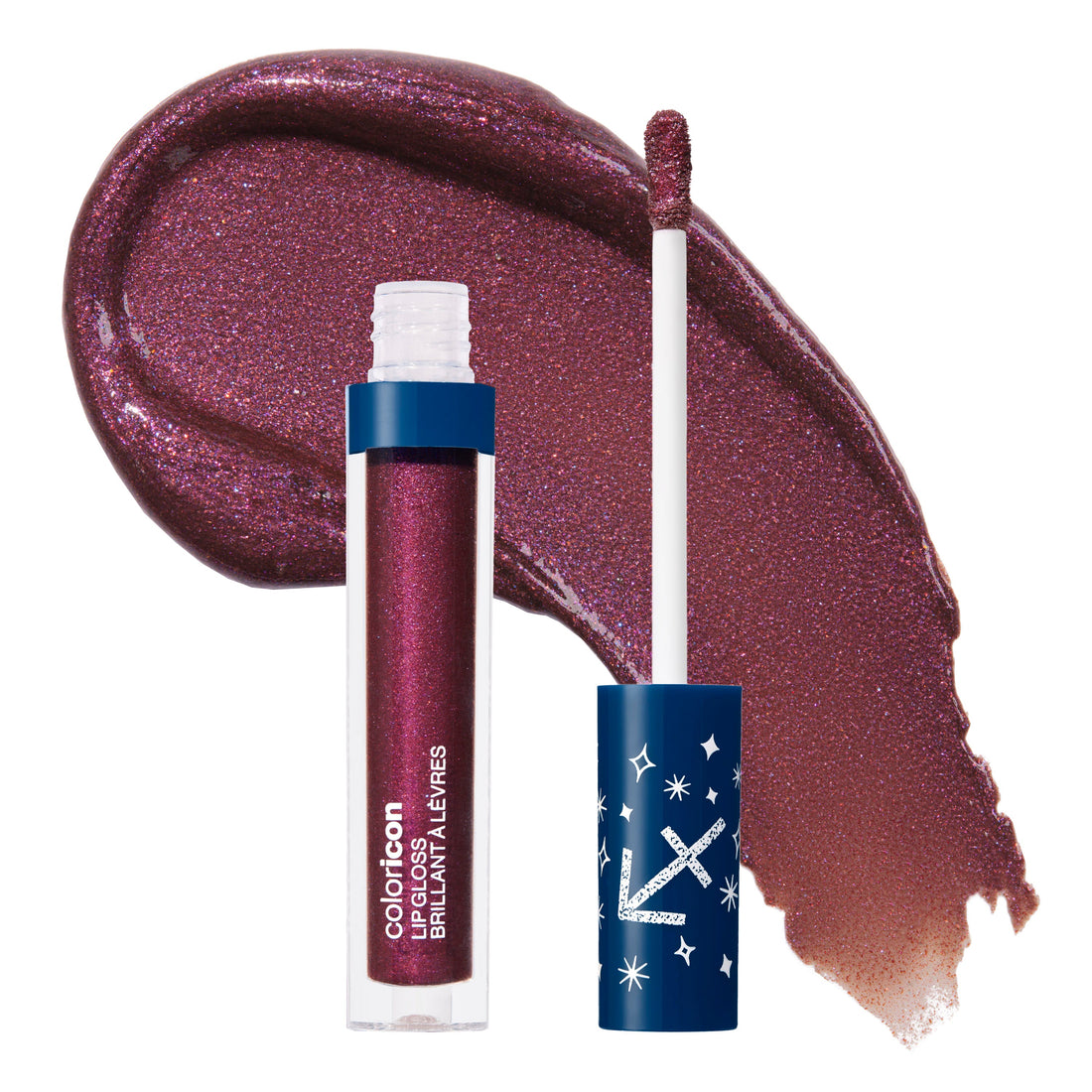 https://cdn.shopify.com/s/files/1/0925/9221/0194/files/Coloricon_Zodiac_Lipgloss_Saggitarius_-_679_open_with_swatch.jpg?v=1760485124