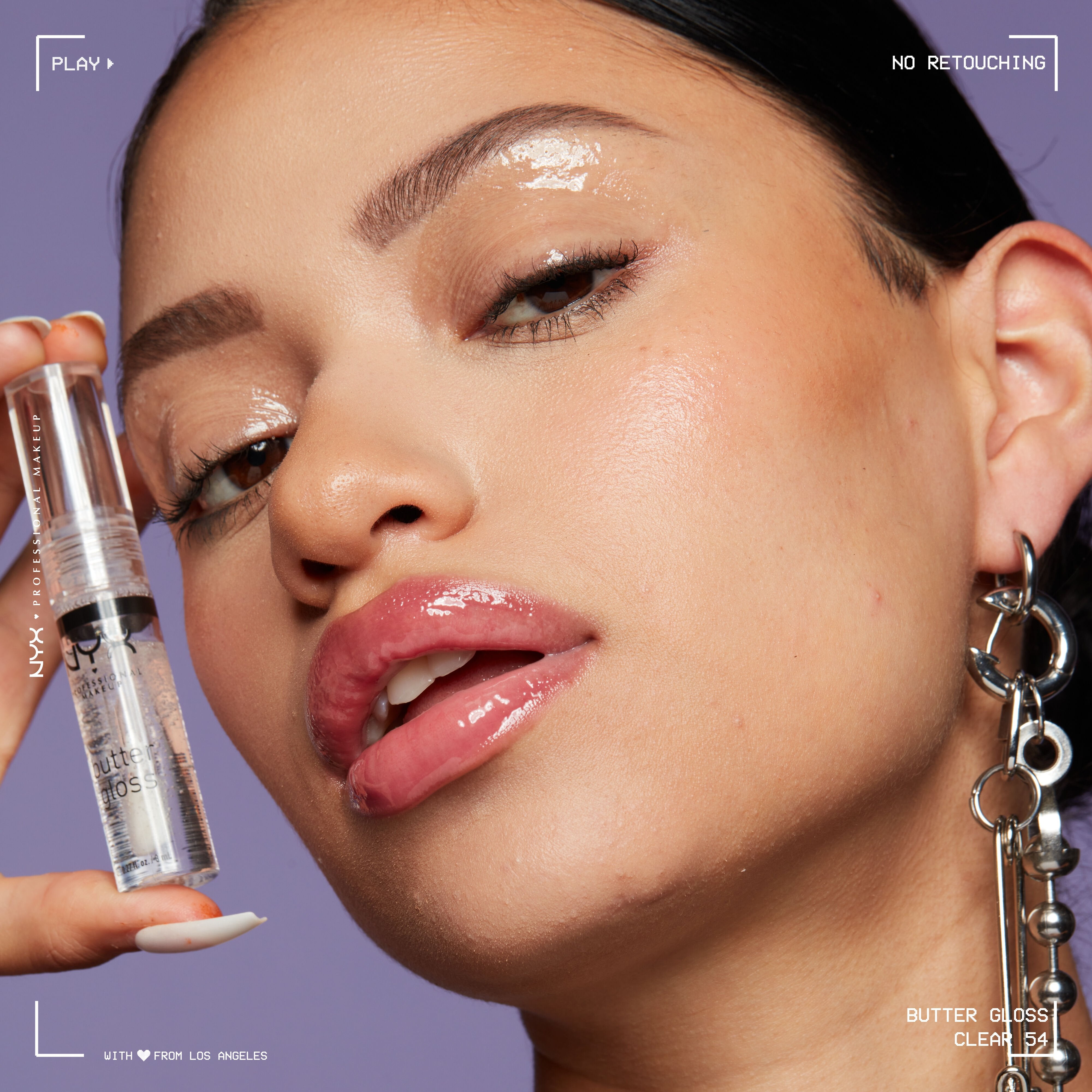 https://www.nyxcosmetics.com/dw/image/v2/AANG_PRD/on/demandware.static/-/Sites-cpd-nyxusa-master-catalog/default/dw056d75c6/ProductImages/2024/LIPS/BLG-ALT-UPDATE/SUGAR-GLASS/NYX-Professional-Makeup-BUTTER-GLOSS-54-Clear-0800897226596-Application-Vanessa-01.jpg